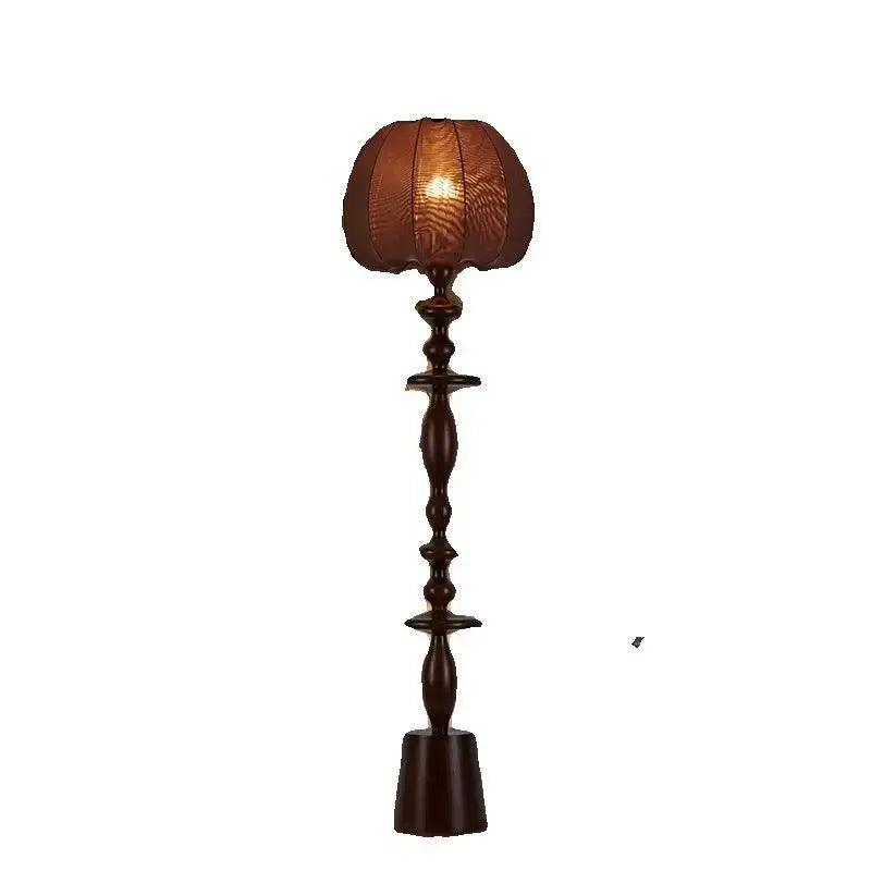 Dark brown wooden floor lamp with textured warm-toned fabric shade from decorbites chinese tassels floor collection