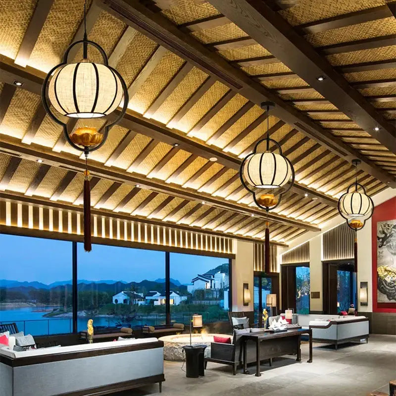 Black-framed woven paper lantern chandelier with golden accents from decorbites teahouse lantern chandelier for dining room