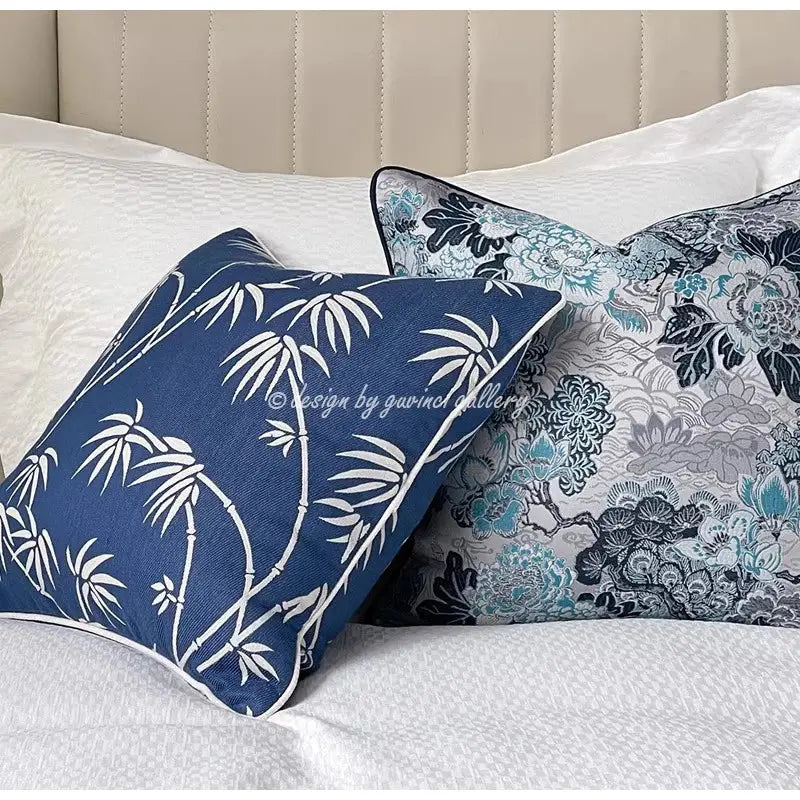Deep blue cushion cover with white bamboo leaf pattern and stitched trim from decorbites chinoiserie blue peony collection