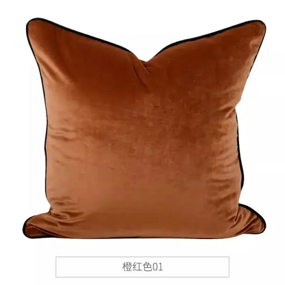 A plush burnt orange velvet decorbites chinoiserie monkey umbrella peonies pillowcase with black piping edges