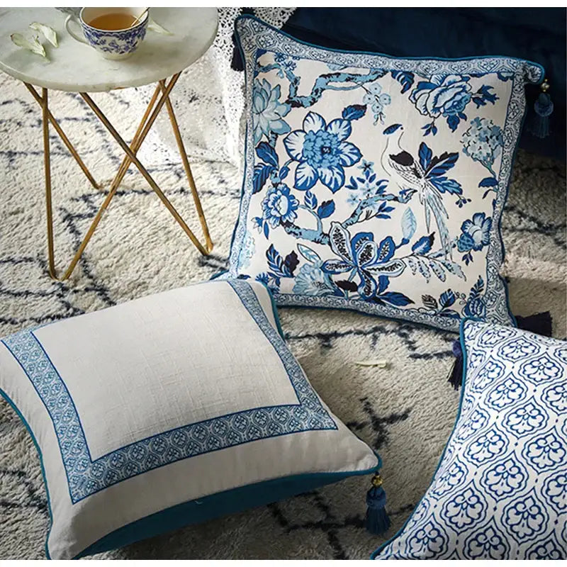 Decorbites chinoiserie style blue and white floral lumbar pillow case with decorative tassels and porcelain birds pattern