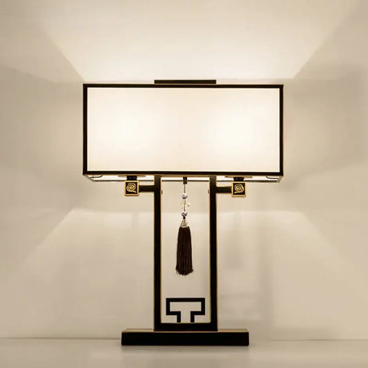 Black-framed decorbites chinoiserie style floor lamp with white fabric shade and gold accents for living room or bedroom