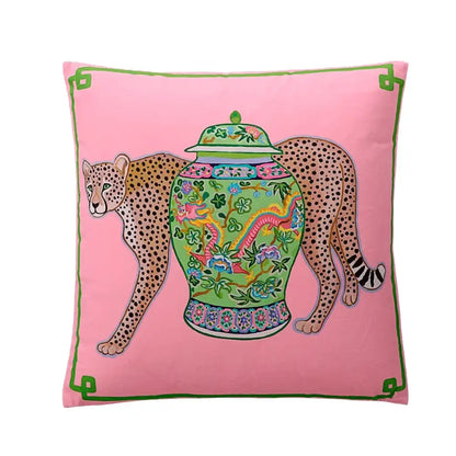 Pink cushion cover featuring a green porcelain jar with floral dragon motifs and cheetahs on the decorbites chinoiserie zebra peonies cushion cover