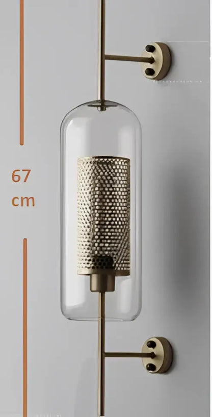 DecorBites™ Chiswick glass wall light sconce with clear glass cylinder and brass mesh shade for vintage home décor
