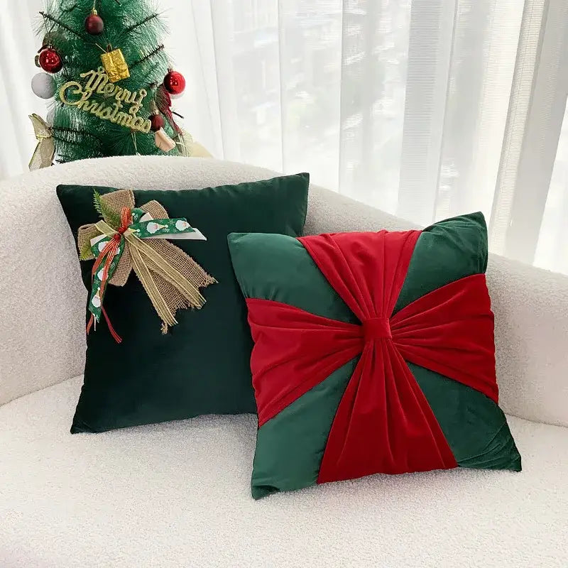 Two decorbites christmas bow patchwork velvet throw pillows in dark green and festive red for holiday home decor
