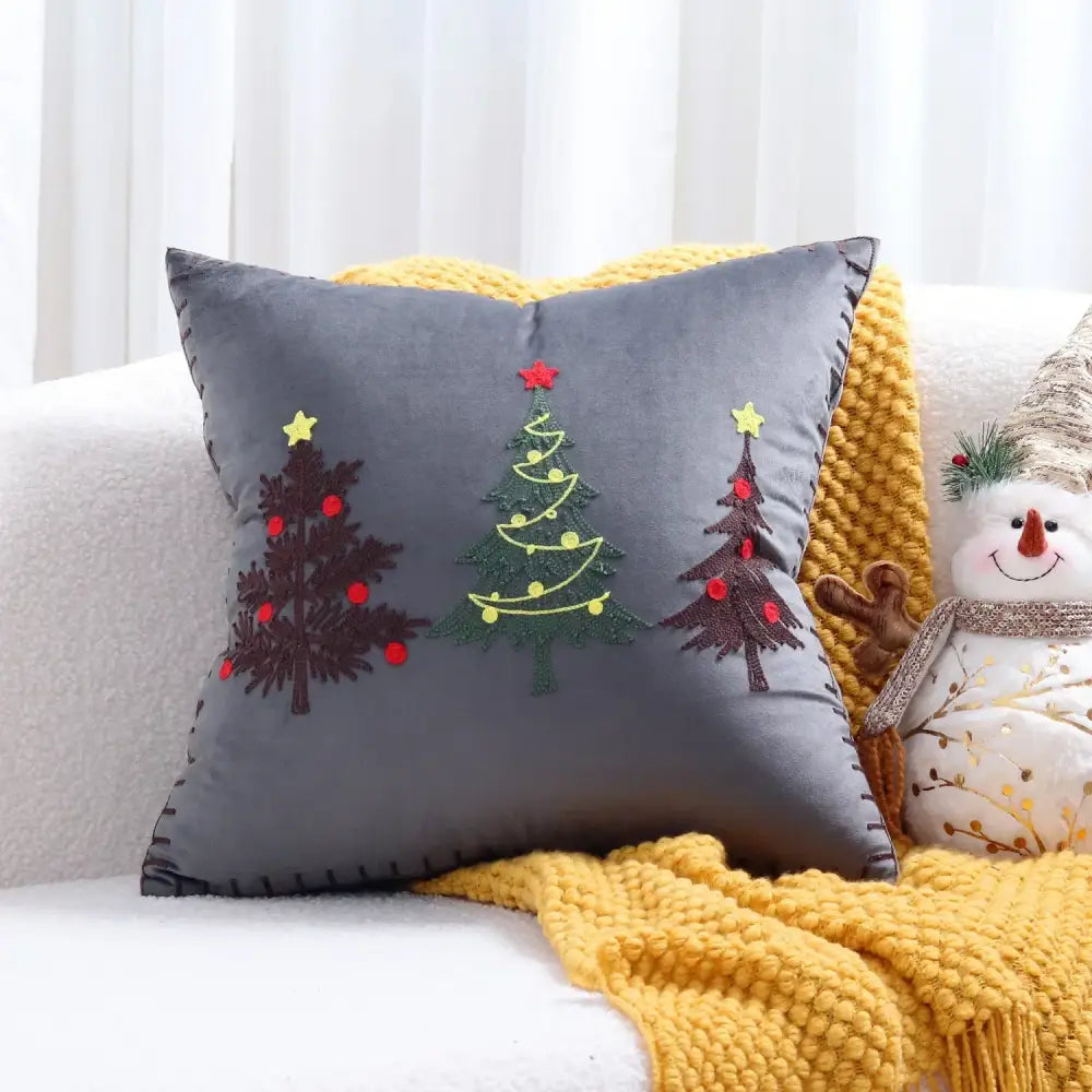 Gray velvet pillow cover with christmas cartoon embroidered trees in brown green and dark green by decorbites christmas cartoon