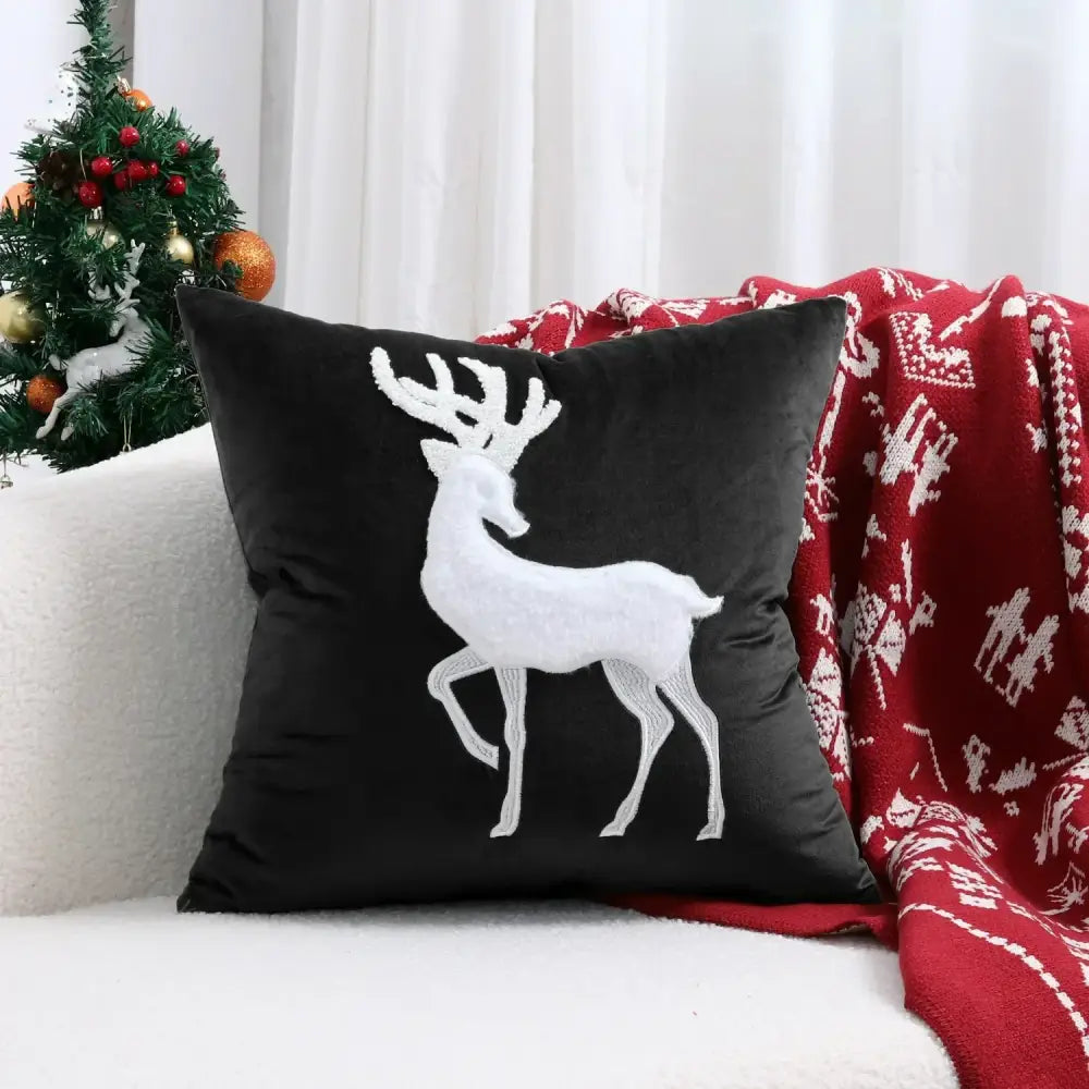 Black velvet pillow cover with white embroidered reindeer design from decorbites christmas cartoon embroidered set for festive decor
