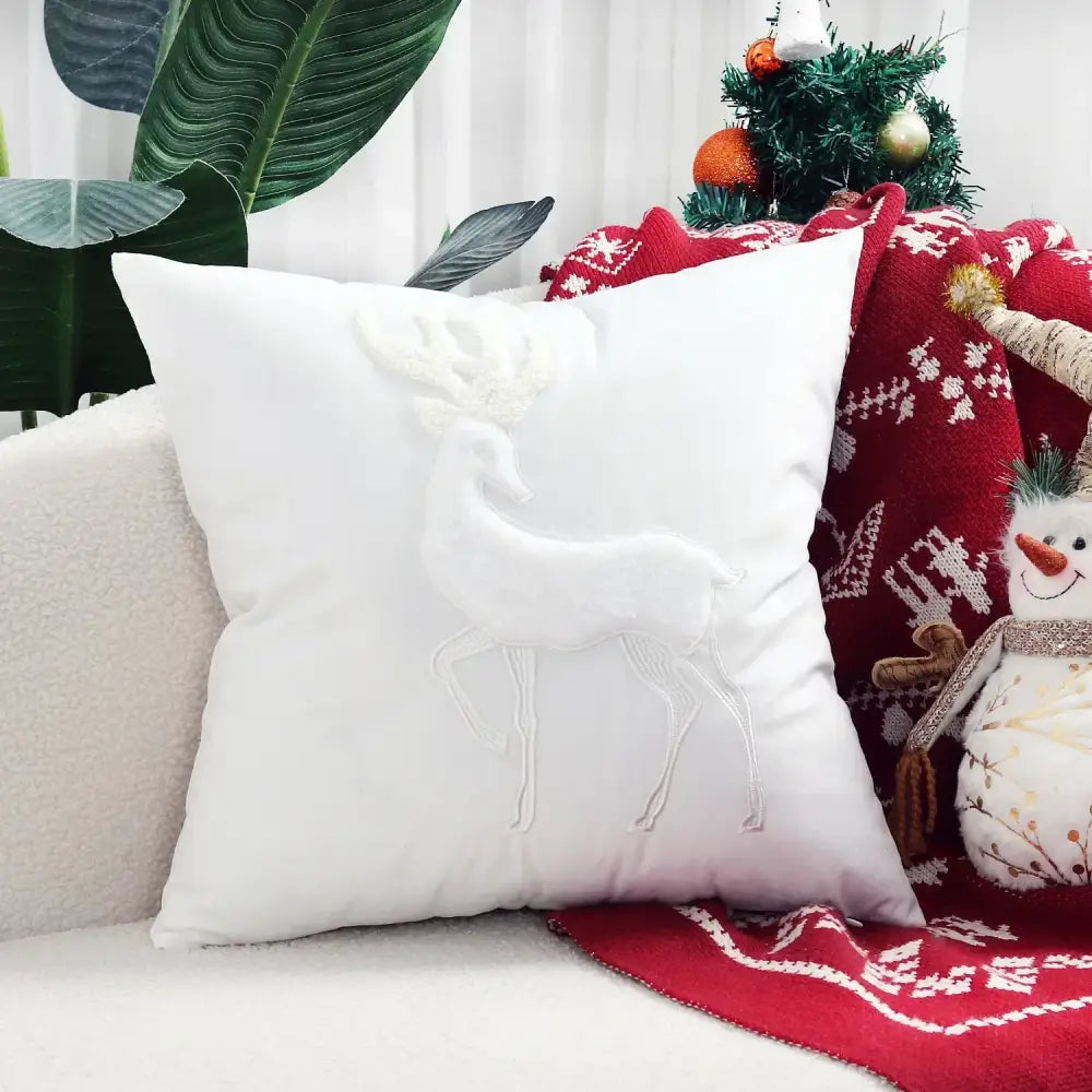 White pillow cover with raised embroidered reindeer design from decorbites christmas cartoon festive set