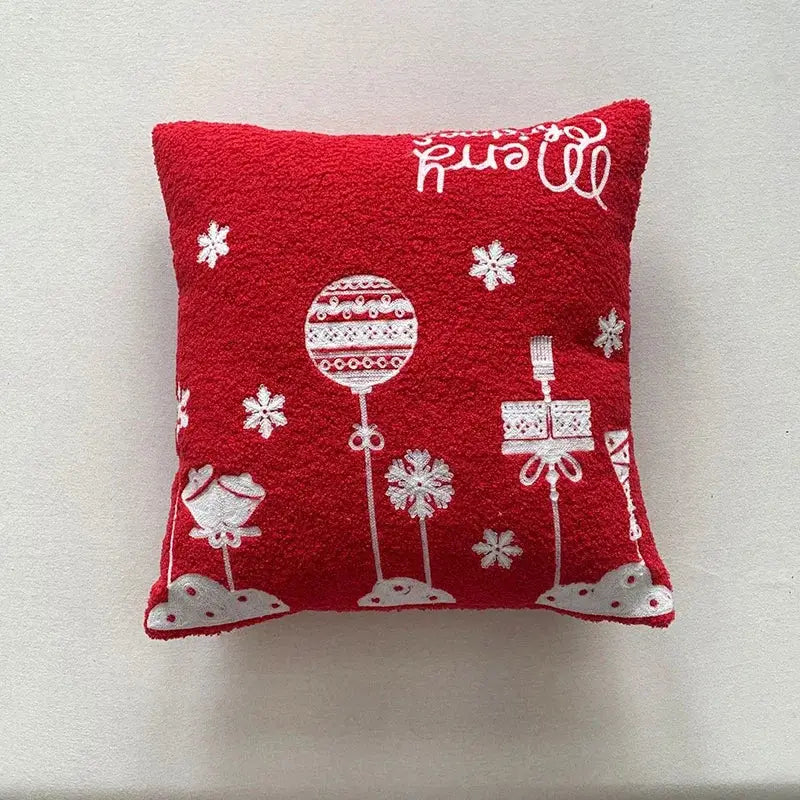 Red decorbites christmas cartoon embroidered pillow featuring white snowflakes ornaments and gift boxes for holiday decor