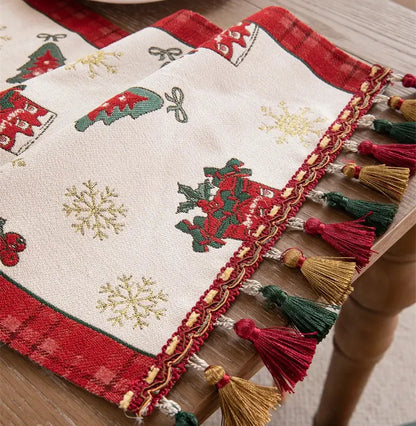 DecorBites™ christmas table runner with embroidered tassel features red and green holiday motifs and gold snowflakes for dining room decor