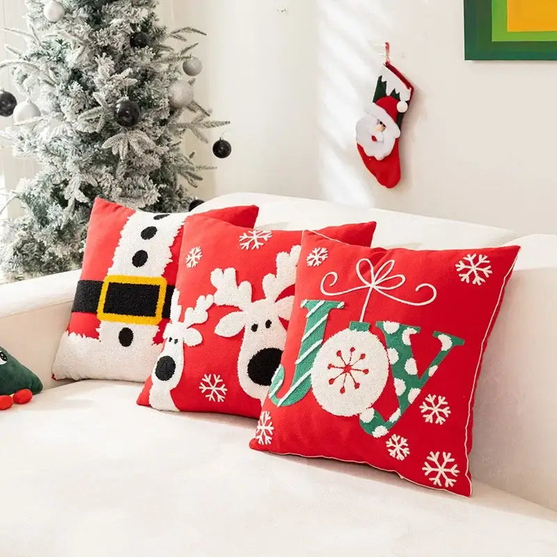 Decorbites christmas cartoon pillow cover with red fabric embroidered joy in green white accented by snowflakes for festive use