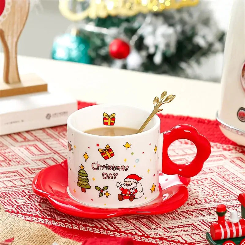 White ceramic christmas ceramic santa tea set by decorbites featuring a mug with red handle and festive saucer