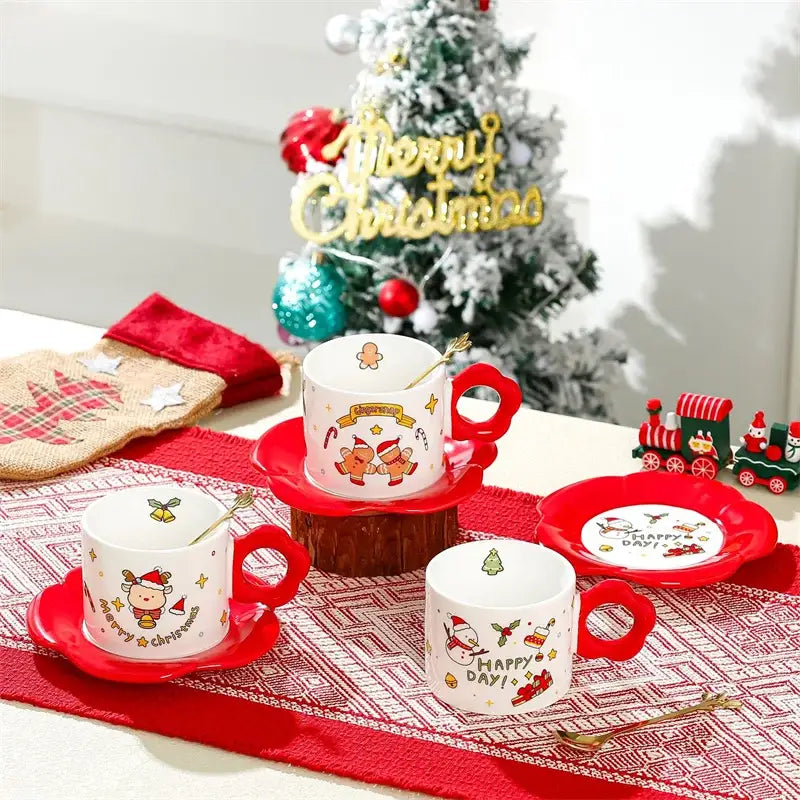 Set of three white ceramic decorbites christmas ceramic santa tea set mugs with red handles and festive holiday illustrations