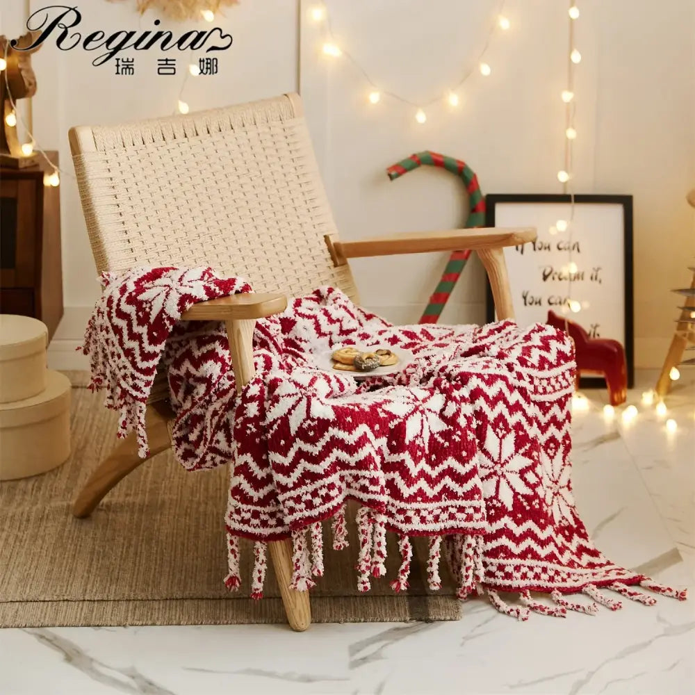 Decorbites christmas chunky knit blanket in red and white microfiber with snowflake patterns and fringed edges