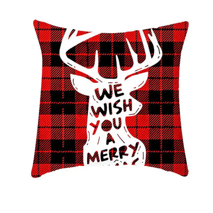 Red and black plaid decorbites christmas cushion cover with white deer silhouette and we wish you a merry text for sofa