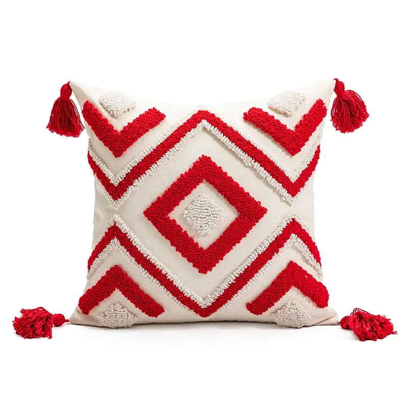 Cream-colored decorbites christmas day embroidered pillowcase with bold red white geometric embroidery and tassels