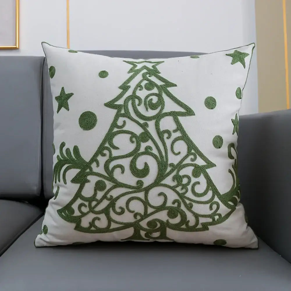 White cushion cover with ornate green embroidered christmas tree design by decorbites christmas décor 45x45cm
