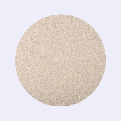 Beige circular placemat with subtle woven texture from decorbites christmas decor placemat set for elegant dining