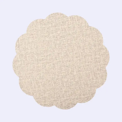 Beige scalloped-edge fabric placemat with subtle woven texture from decorbites christmas decor placemat set