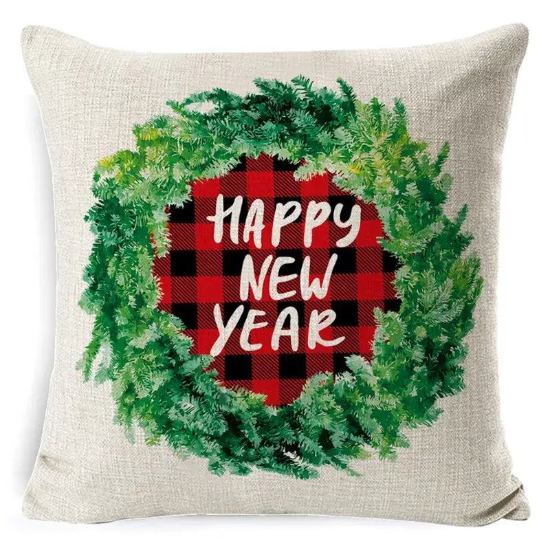 Beige linen pillow cover with festive green wreath and red black plaid center featuring happy new year text decorbites christmas deer