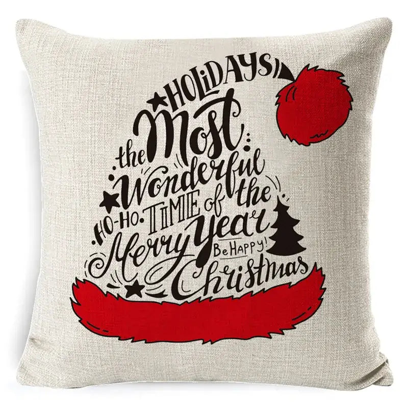 Beige linen pillow cover with decorbites christmas deer festive hat design black cursive text and red accents 45x45cm
