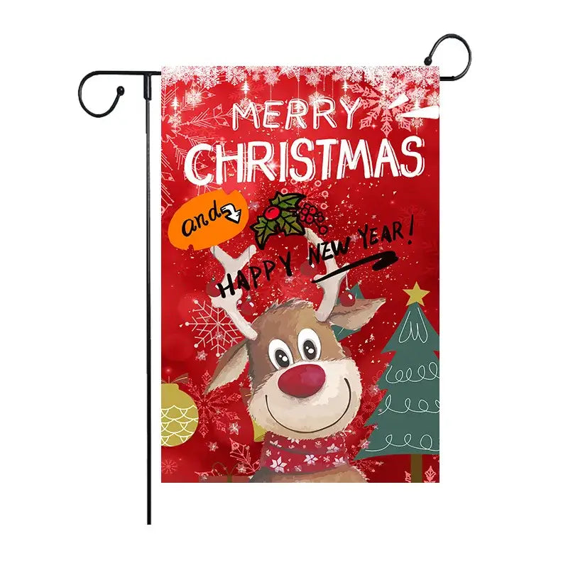 Red christmas garden flag by decorbites featuring a cartoon christmas deer with antlers and festive scarf outdoors