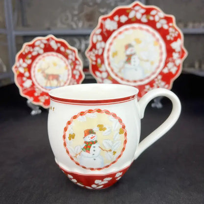 White ceramic mug with red trim and snowman design from decorbites christmas dinnerware set for festive use