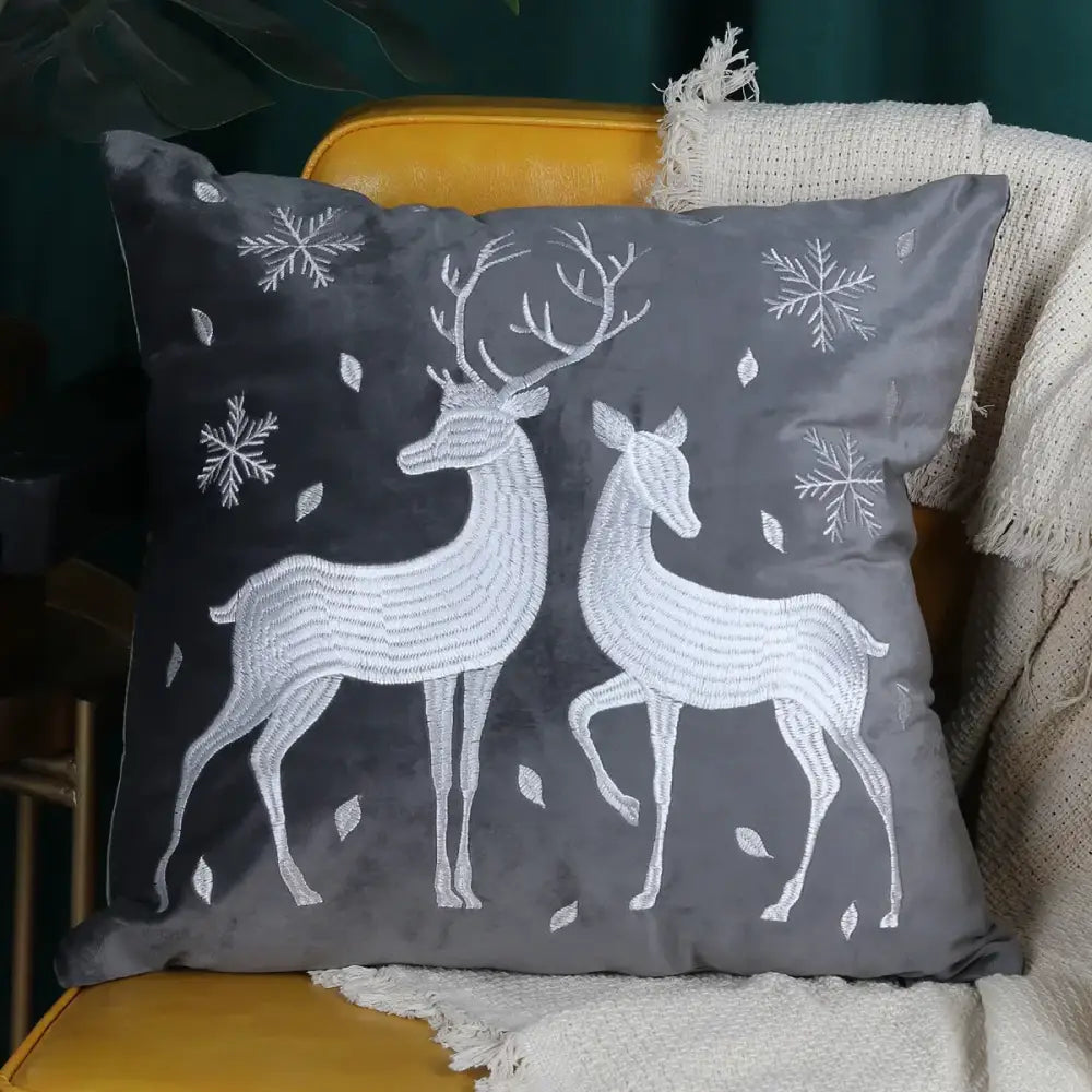 Gray velvet cushion cover featuring decorbites christmas elk embroidered with white deer and snowflake patterns