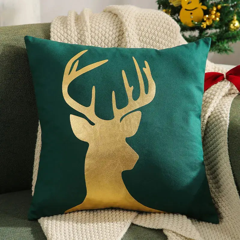 Emerald green velvet pillow cover with gold foil christmas elk silhouette from decorbites christmas elk collection