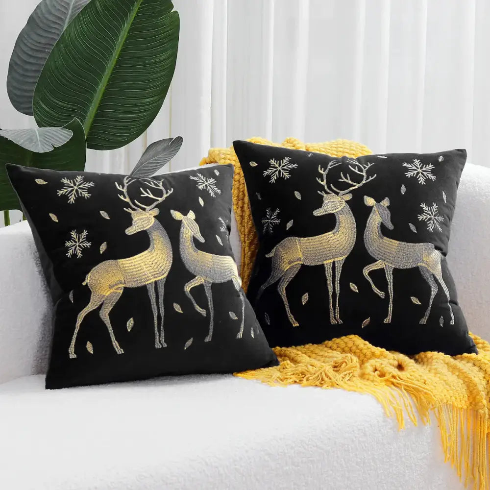 Black velvet pillow covers with embroidered gold and silver deer and snowflake patterns decorbites christmas elk design