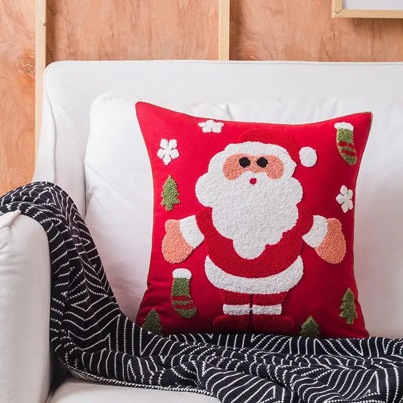 Red christmas embroidered cotton pillow covers by decorbites featuring fluffy santa claus and festive snowflakes design