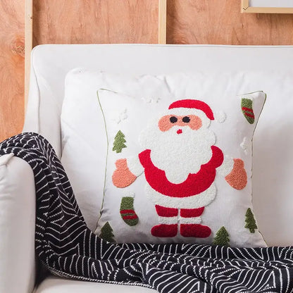 White cushion cover with decorbites christmas embroidered santa claus and green pine trees design