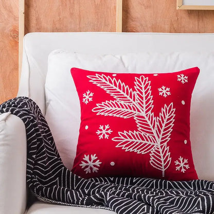 Red velvet decorbites christmas embroidered cushion cover with white embroidered pine branches and snowflakes design