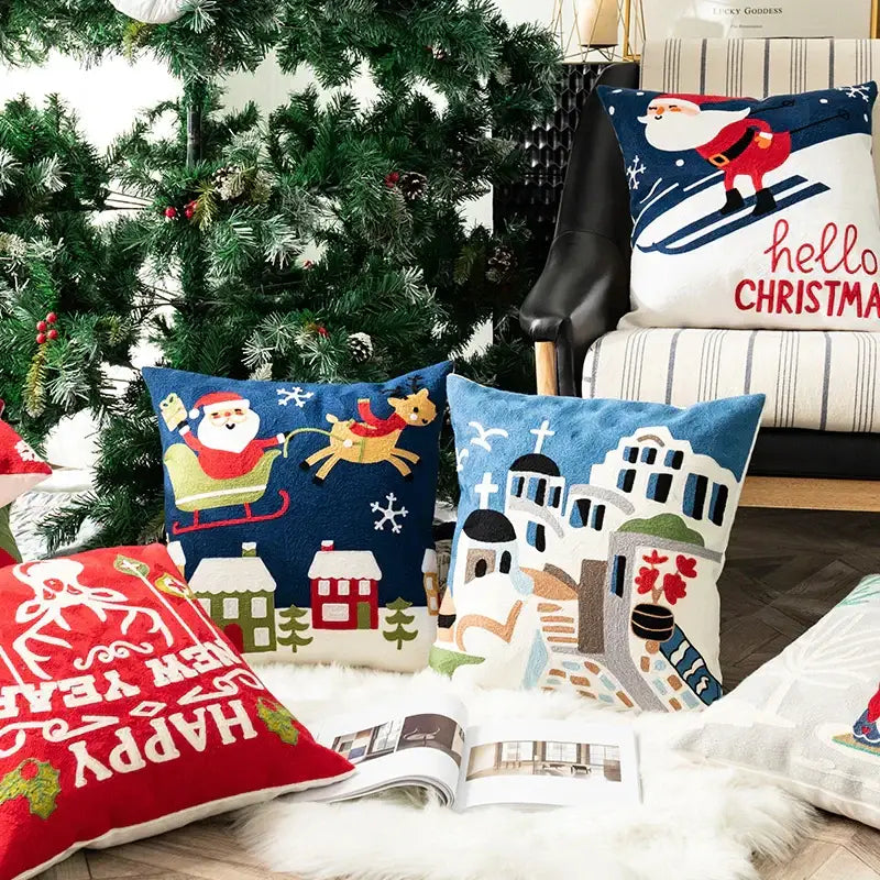 Blue and white decorbites christmas embroidered pillow cover set with santa sleigh snowflakes and festive village scenes