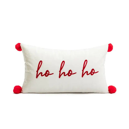 White rectangular cushion cover with red embroidered ho ho ho text and pom-poms decorbites christmas embroidered red design