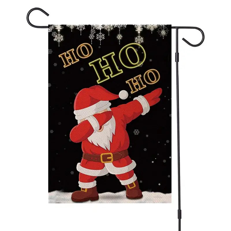 Black garden flag featuring cartoon santa dabbing in red and white suit with gold ho ho ho text decorbites christmas festive