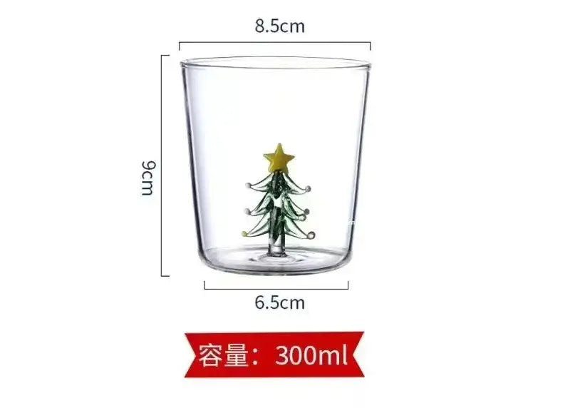 Clear glass goblet with green christmas tree design and yellow star from DecorBites™ glass goblet set for festive use