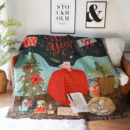 A cozy dark green woven decorbites christmas holiday sofa blanket with festive new year illustration and red teal accents