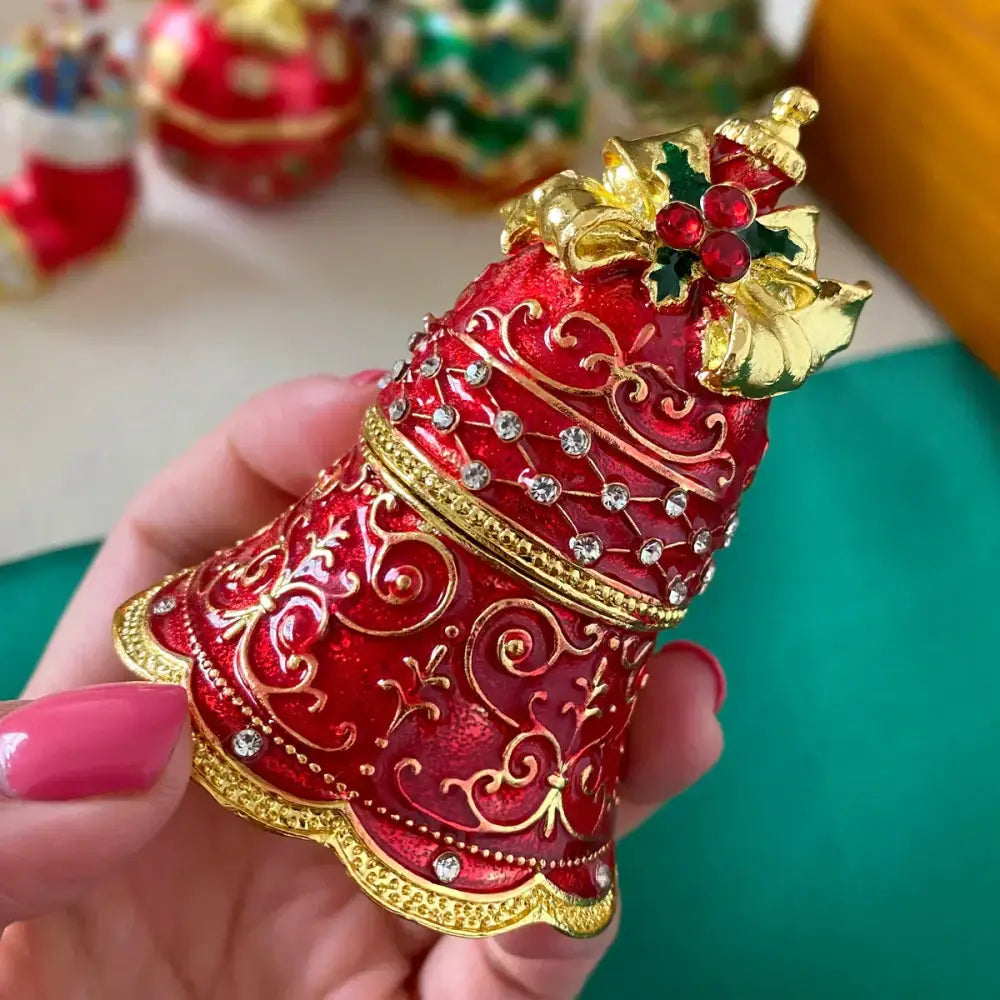 Decorbites christmas jingle trinket box in red and gold with rhinestones holly and intricate filigree design