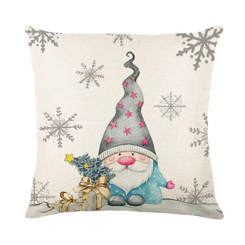 Beige linen pillow cover featuring a cartoon gnome with silver snowflakes decorbites christmas letter print design