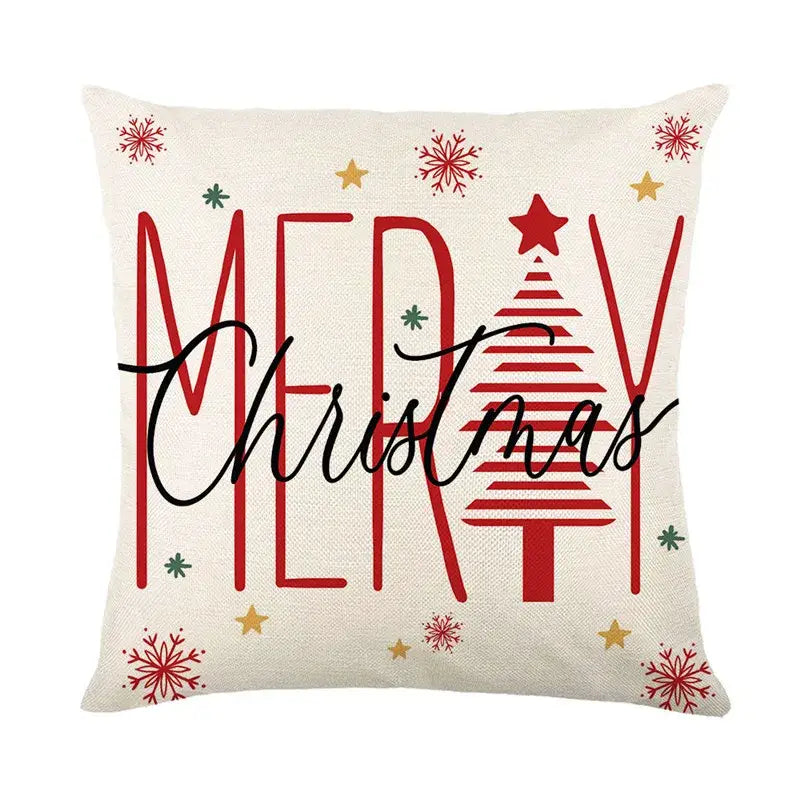Cream-colored linen pillow cover with red and black merry christmas text and stylized tree decorbites christmas letter print
