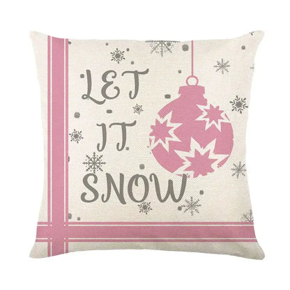 Cream-colored linen pillow cover with pink festive christmas letter print and let it snow design by decorbites christmas letter