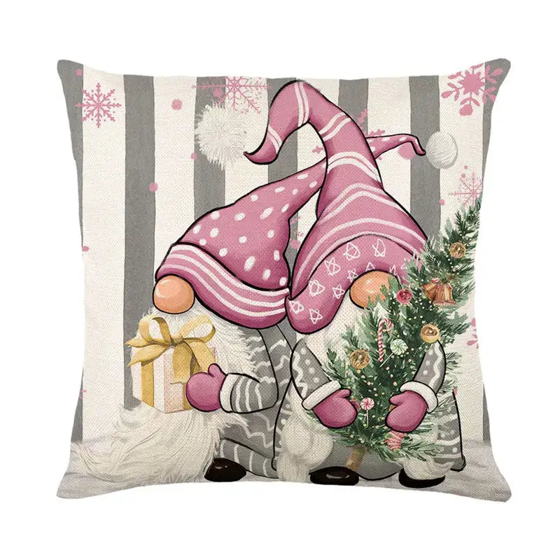 Square pillow cover with decorbites christmas letter print featuring two pink-hatted gnomes on linen for holiday decor