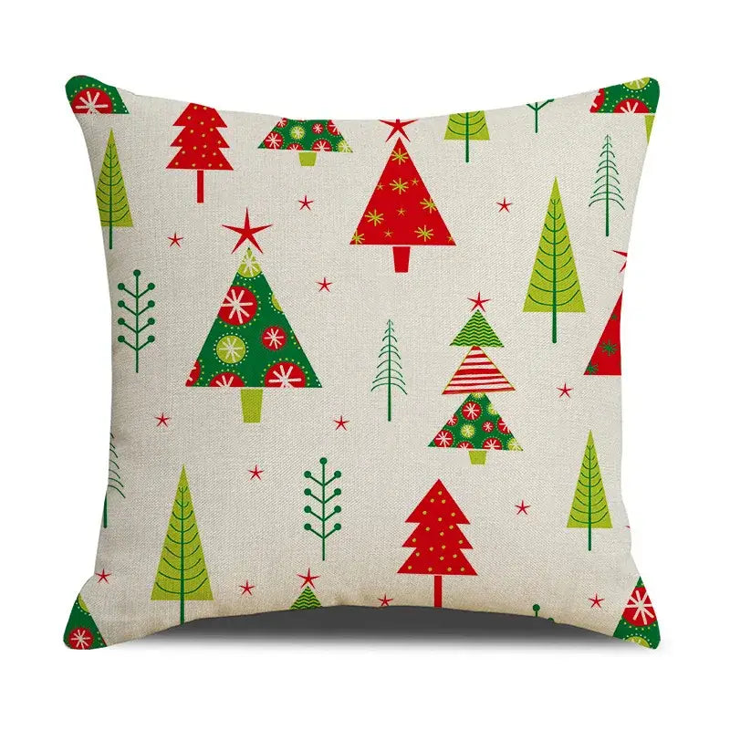 Festive decorbites christmas linen cushion cover with red and green christmas tree pattern on off white linen background