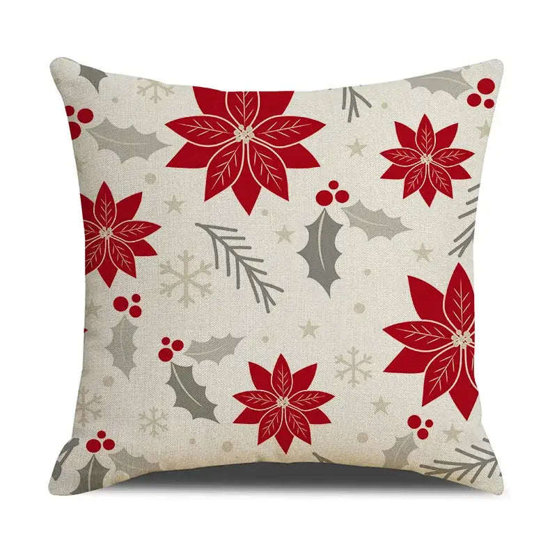 Festive cushion cover with red poinsettias and gray holly on off-white decorbites christmas linen fabric