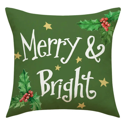Green christmas linen decorative throw pillow with merry and bright white script gold stars and holly berry clusters