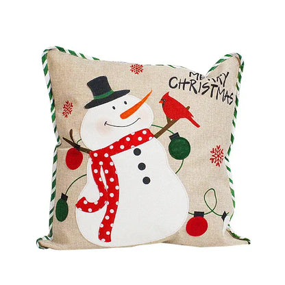 Beige linen pillow cover featuring a cheerful snowman with embroidered snowflake accents from decorbites christmas patchwork