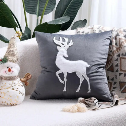 Gray velvet cushion cover with white embroidered reindeer design from decorbites christmas patchwork merrychristmas collection