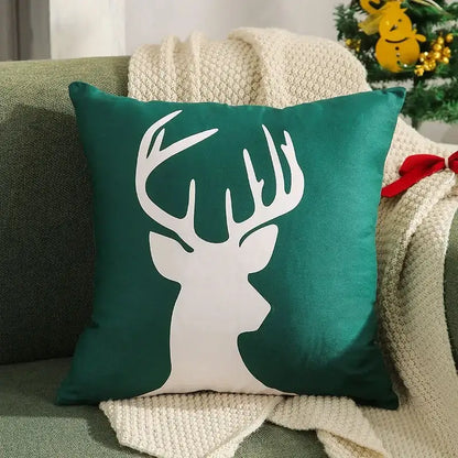 Teal velvet cushion cover with bold white deer silhouette from decorbites christmas patchwork merrychristmas collection