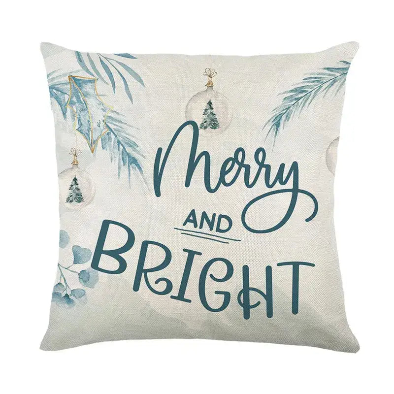 Beige linen throw pillow from decorbites christmas pillowcase collection with merry and bright teal script and festive holly leaves